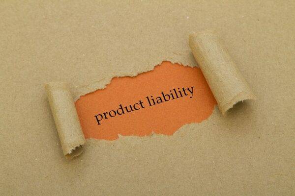 paper peeled away to reveal the words product liability